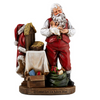 Adoring Santa With Baby Jesus Christmas Statue